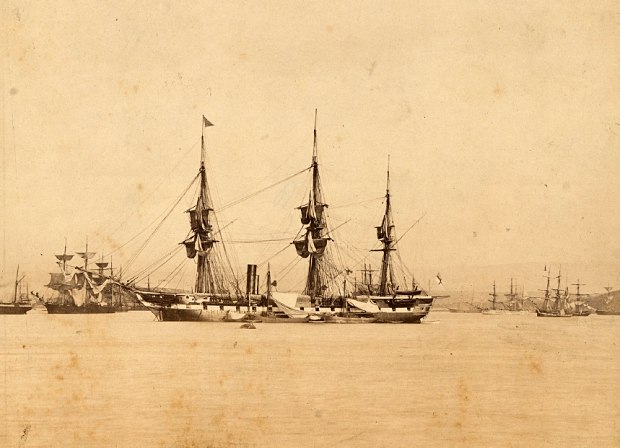 HMS Topaze embarking powder & shell preparatory to sailing for South Pacific. 1866. Plymouth Sound. HMS Topaze embarking powder & shell preparatory to sailing for South Pacific. 1866. Plymouth Sound.